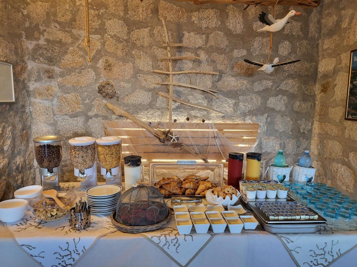 Hotel Olimpia Baja Sardinia Kültér fotó
