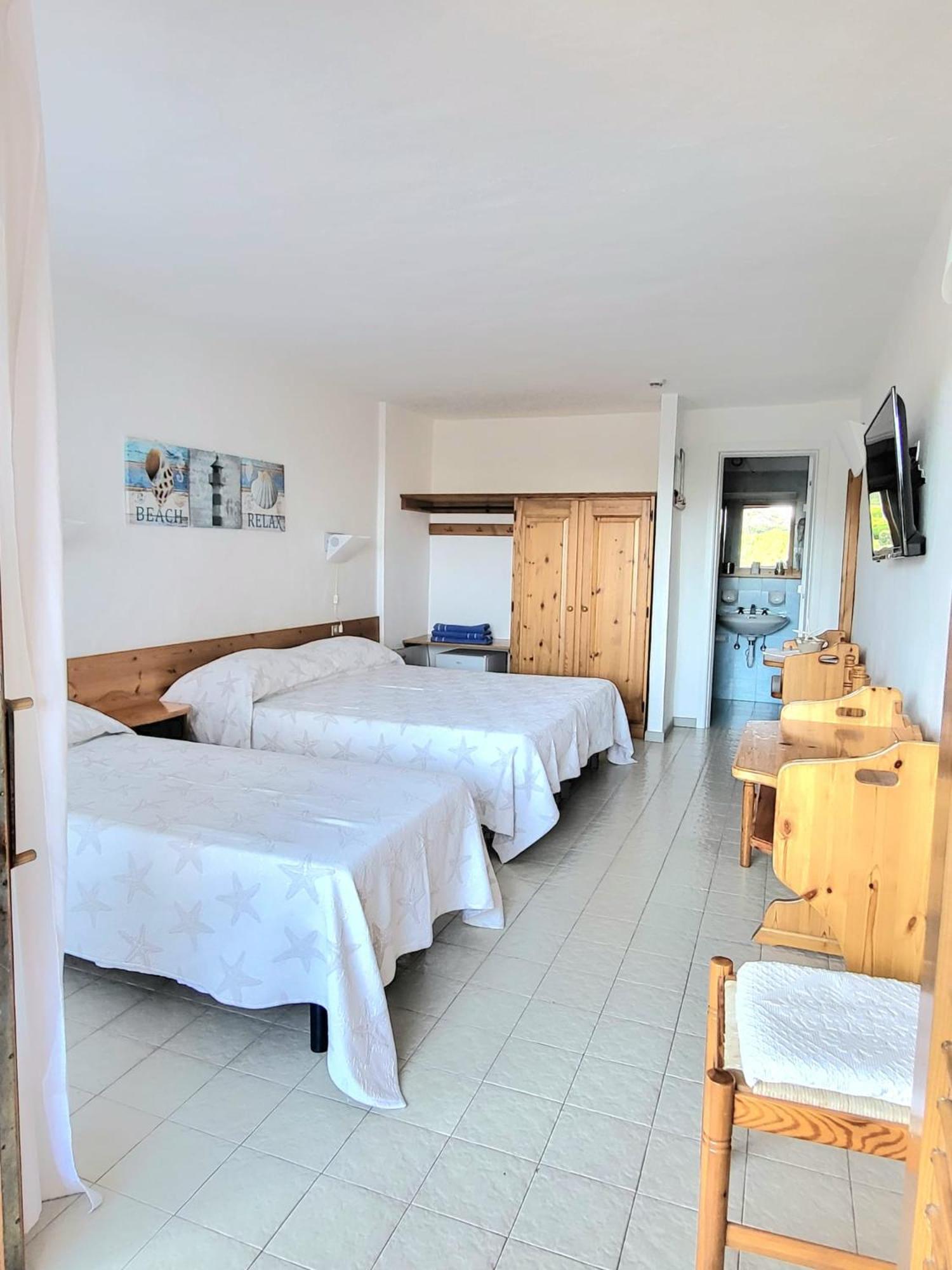 Hotel Olimpia Baja Sardinia Kültér fotó