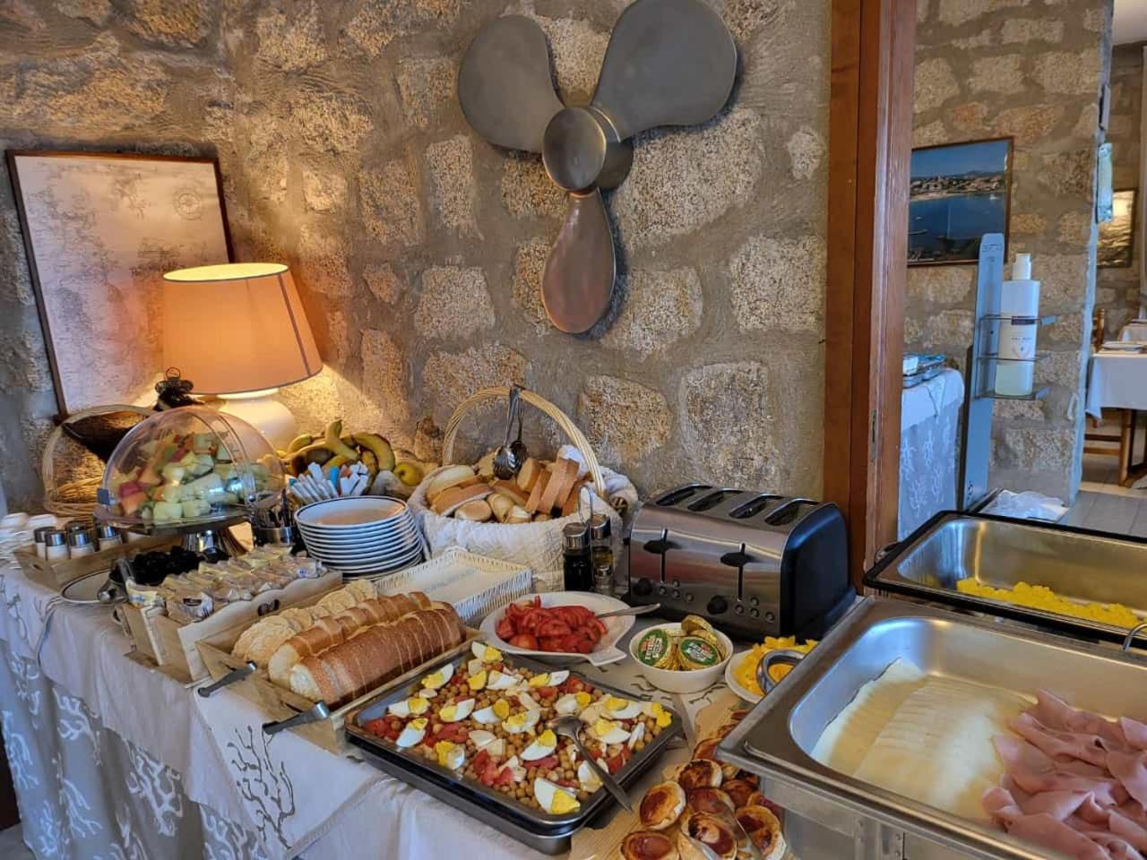 Hotel Olimpia Baja Sardinia Kültér fotó